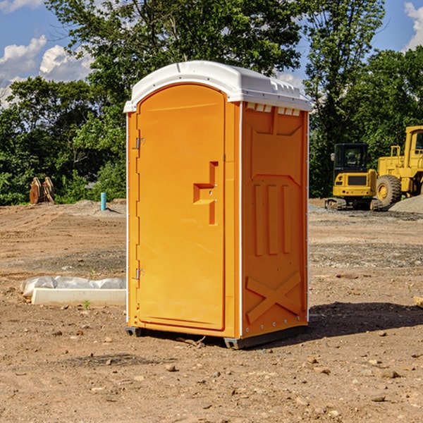 how can i report damages or issues with the portable restrooms during my rental period in Natural Dam